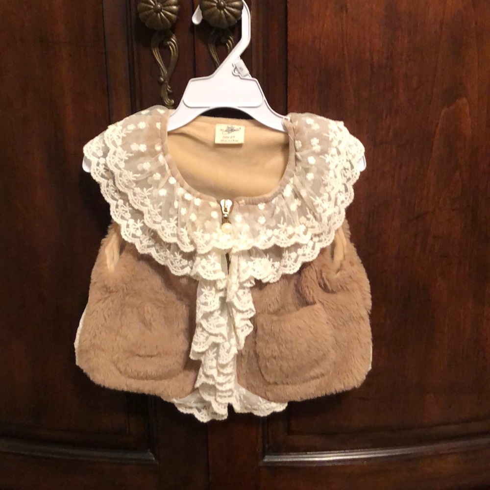 Gorgeous M.L.Kids vest with pearl enhanced zipper